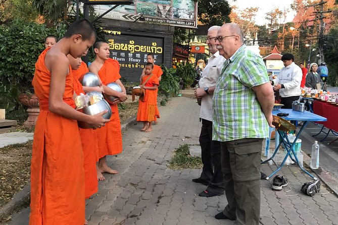 Alms and Wat Phra That Doi Suthep Private Chiang Mai Tour - Walking the local streets: small moments that make the day feel real