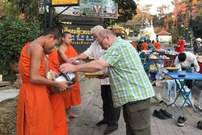 Alms and Wat Phra That Doi Suthep Private Chiang Mai Tour - Wat Phra That Doi Suthep: mountaintop temple time with cable car convenience