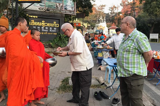 Alms and Wat Phra That Doi Suthep Private Chiang Mai Tour - Warorot Market stop: practical local browsing and easy snack potential