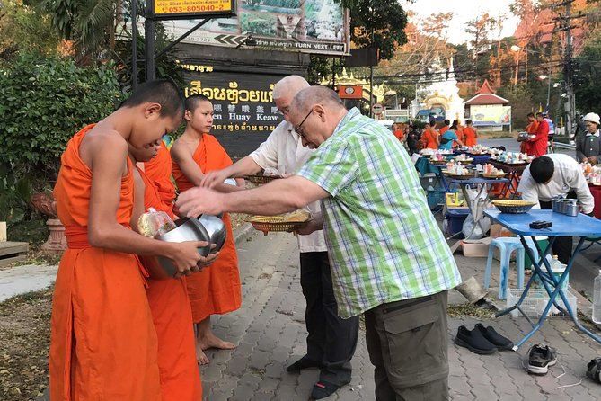 Alms and Wat Phra That Doi Suthep Private Chiang Mai Tour - Wat Phra That Doi Suthep: mountaintop temple time with cable car convenience