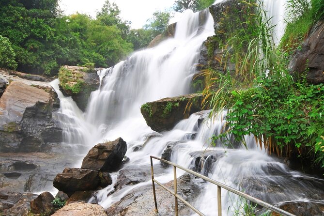 Chiang Mai: Doi Inthanon, Waterfalls, and Hill Tribe Village - Wachirathan Falls: the misty, granite-cliff show