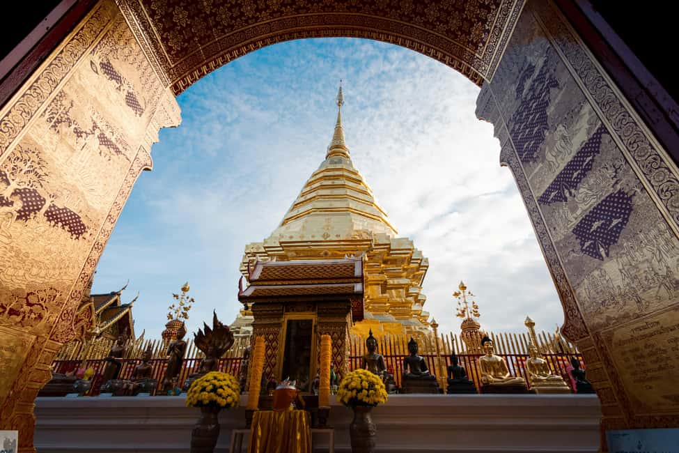 Chiang Mai: Doi Suthep Temple Guided Tour - Entering the sacred grounds: gongs, bells, and golden pillars