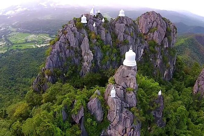 Chiang Mai Exotic Excursion Unseen Miracle of Faith To Pupadang Lampang Temple - Wat Chaloem Phra Kiat: Buddha Footprint Temple on Doi Pu Yak