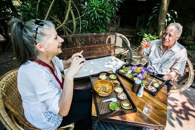 Chiang Mai Mae Ping River Cruise and Thai Farmer House Visit - Food and drinks: herbal drink, fruit platter, ice cream, and Khao Soi