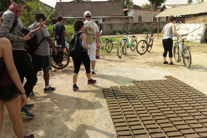 Chiang Mai Paradise Full-Day Cycling Adventure Tour - Chedi, ancient ruins, and a busy fresh market