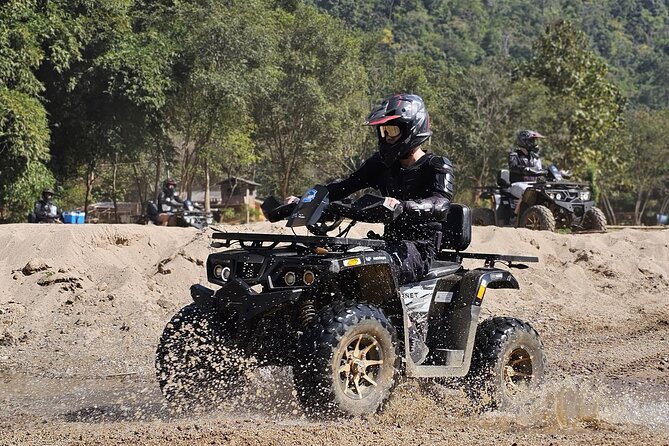 Chiang Mai Sticky Waterfall Tour ATV and Scenic Café - ATV time in Mae Taeng jungle: dirt trails, rice paddies, and real speed control
