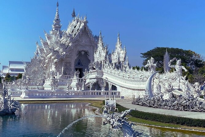 Chiang Rai Temples Tour & Golden Triangle Including Boat to Laos - Wat Rong Seur Ten (Blue Temple): community roots, then a modern visit