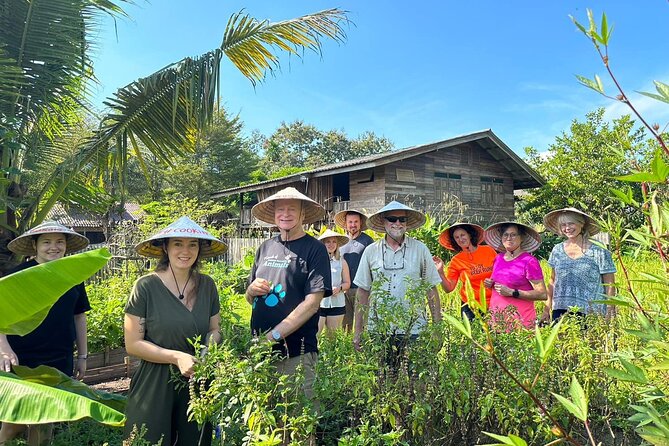 Cooking Class with Organic Farm in Chiang Mai - Organic farm setting: picking herbs and using 1.6 acres of crops