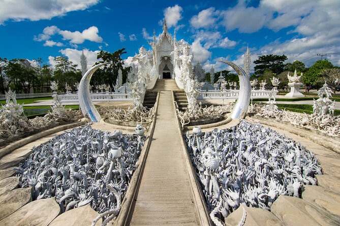 Full Day Chiang Rai 3 Temples White, Blue,Big Bhudha Temples - Wat Rong Suea Ten Blue Temple: murals, mythology, and donation expectations