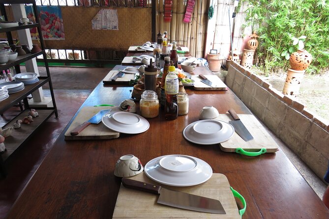 Half-Day Thai Cooking Class and Market Tour From Chiang Mai - Inside the Open-Air Kitchen: Your Station, Your Tempo