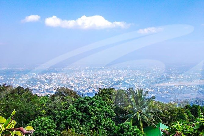 Wat Doi Suthep Temple and White Meo Hilltribe Village Half-Day Tour from Chiang Mai - Doi Suthep-Pui National Park: The Scenic Drive That Sets the Tone