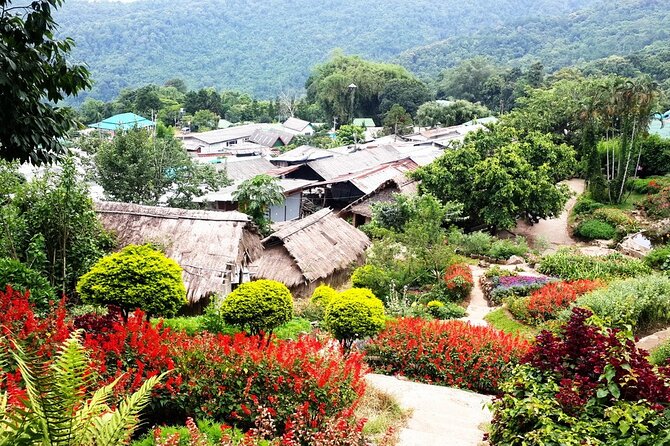 Wat Phra That Doi Suthep & Hmong Village Half Day Tour From Chiang Mai - Hmong Village visit: colorful garments and real cultural conversation
